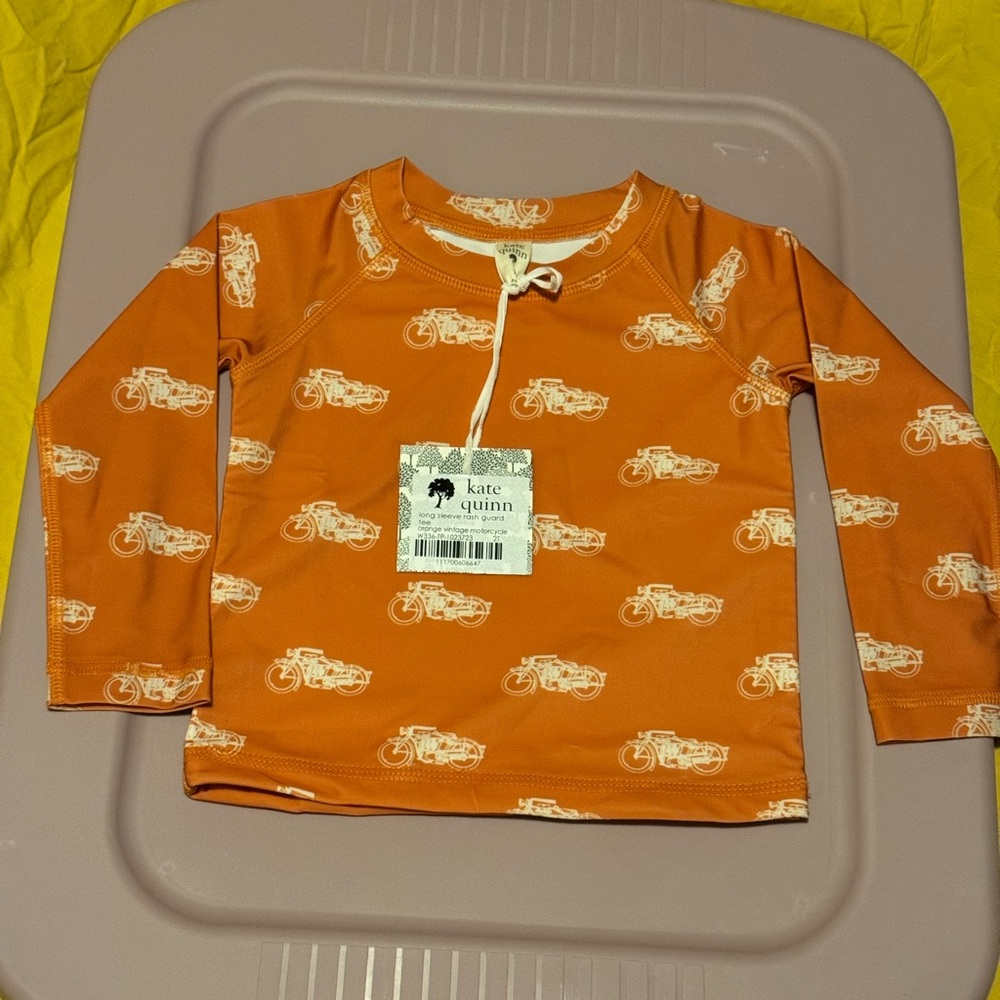 Kate Quinn Orange Rashguard with Motorcycle Print, BNWT